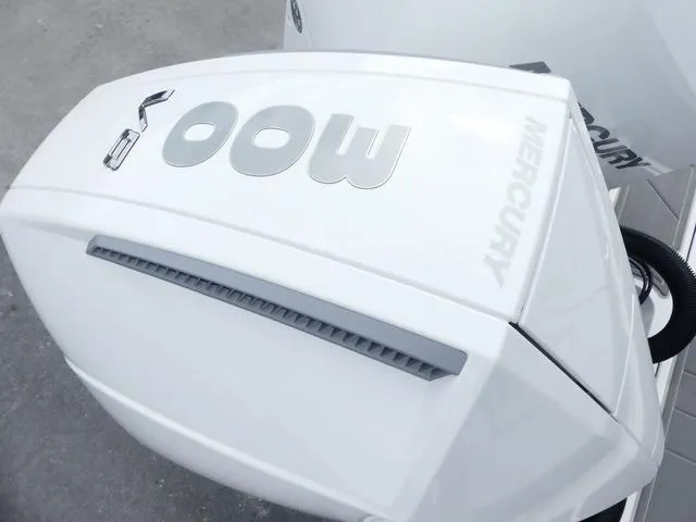 Slide: The Image of 2025 Monterey Elite 30 OB with Mercury 600 outboard engine, close-up view. - 14