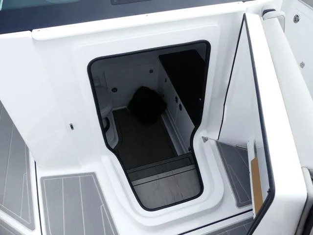 Slide: The Image of 2025 Monterey Elite 30 OB boat interior cabin entrance. - 30