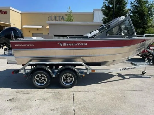 The Image of 2025 Spartan 185 Astoria boat on trailer, parked outdoors, side view. - 0