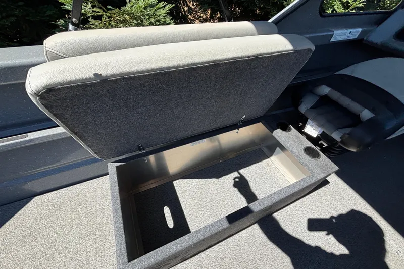 Slide: The Image of Open storage compartment in 2025 Spartan 185 Astoria boat interior. - 37