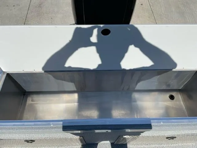 Slide: The Image of 2025 Spartan 185 Astoria boat interior with shadow on metal surface. - 6