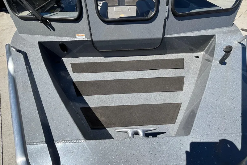 Slide: The Image of Bow of 2025 Spartan 185 Astoria boat with non-slip surface and cleat. - 32