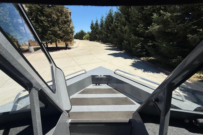 Slide: The Image of Interior view of 2025 Spartan 200 Astoria boat, showcasing sleek design and spacious layout. - 22