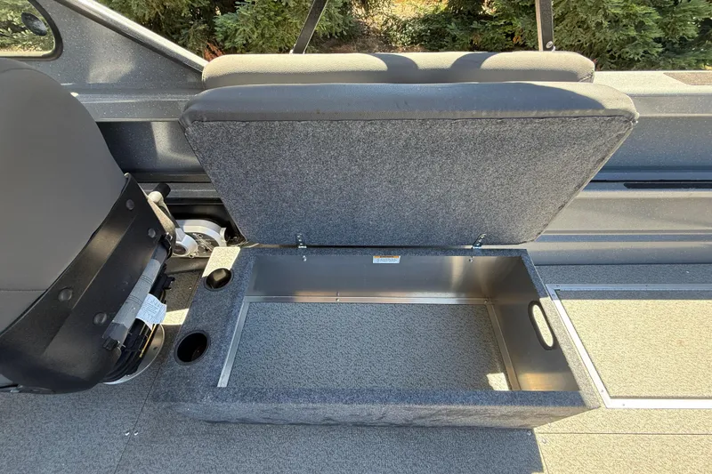 Slide: The Image of Open storage compartment in 2025 Spartan 200 Astoria boat, showcasing spacious interior design. - 17