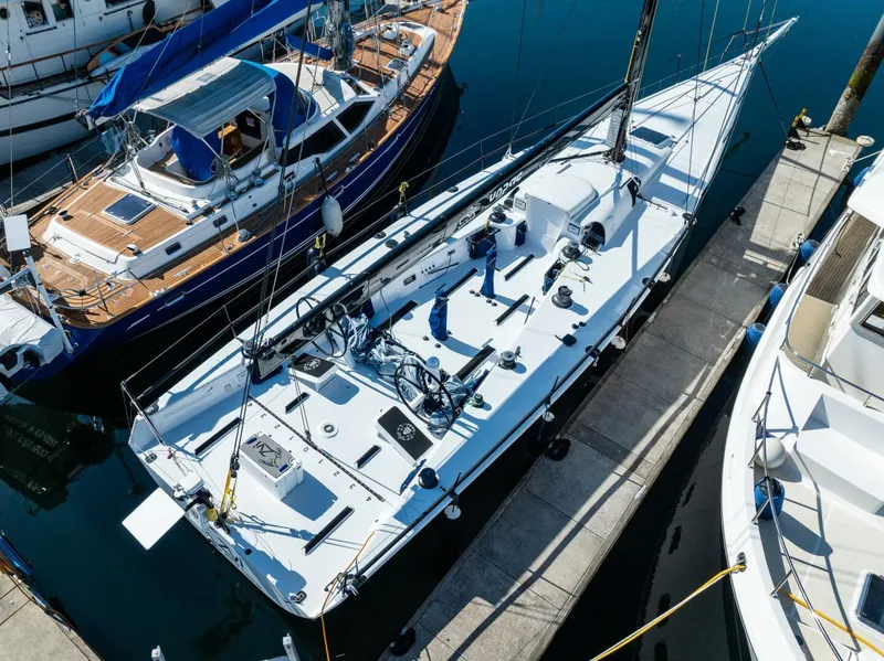Slide: The Image of Aerial view of a 2007 McConaghy Reichel/Pugh sailboat docked at a marina. - 1