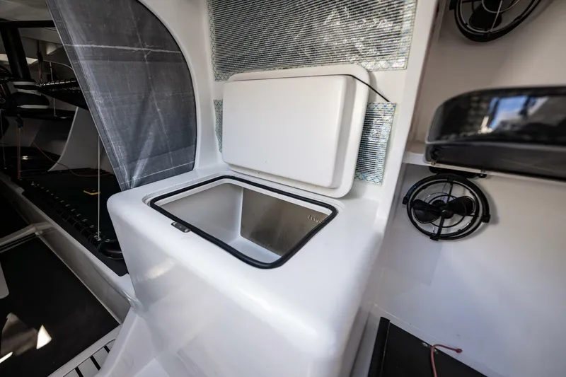 Slide: The Image of Interior of 2007 McConaghy Reichel/Pugh yacht, featuring a sleek, modern sink area. - 13