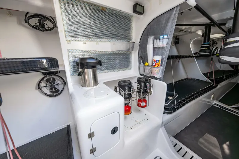Slide: The Image of Interior of 2007 McConaghy Reichel/Pugh yacht with kitchen area and storage. - 14