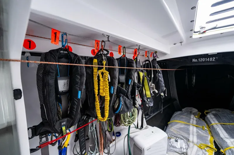 Slide: The Image of Interior of 2007 McConaghy Reichel/Pugh yacht with safety gear and equipment storage. - 16