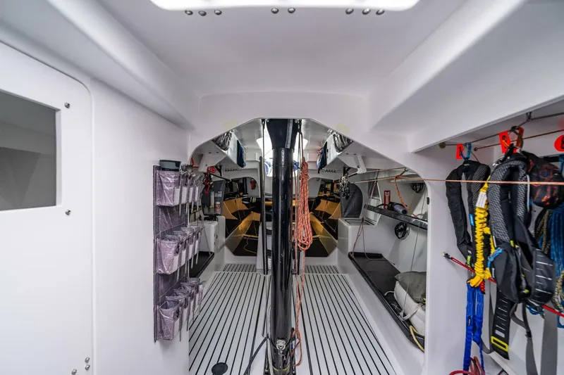 Slide: The Image of Interior of 2007 McConaghy Reichel/Pugh yacht, featuring sleek design and organized storage. - 19