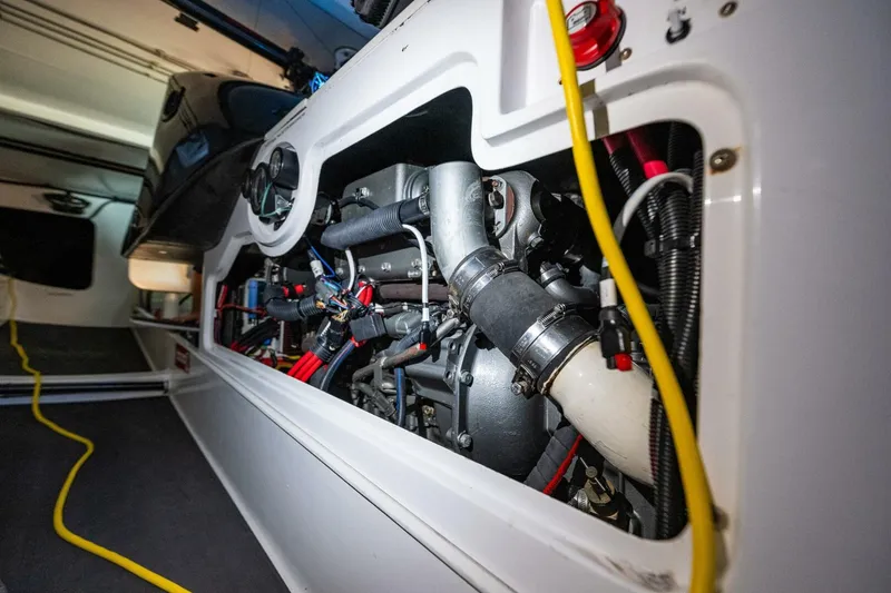 Slide: The Image of Engine compartment of a 2007 McConaghy Reichel/Pugh yacht, showcasing detailed mechanical components. - 26