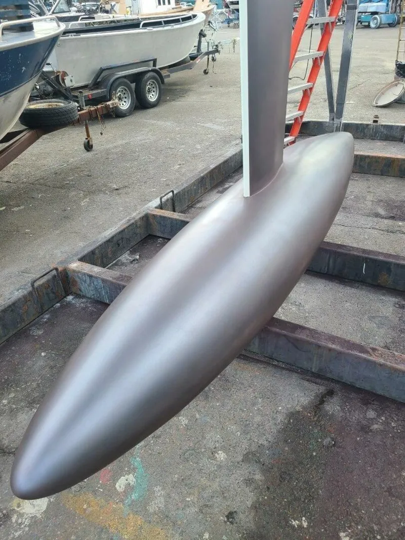 Slide: The Image of 2007 McConaghy Reichel/Pugh yacht keel on a trailer in a boatyard. - 46