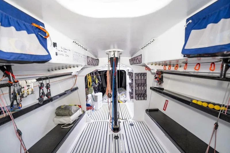 Slide: The Image of Interior of 2007 McConaghy Reichel/Pugh yacht, featuring organized storage and sleek design. - 8