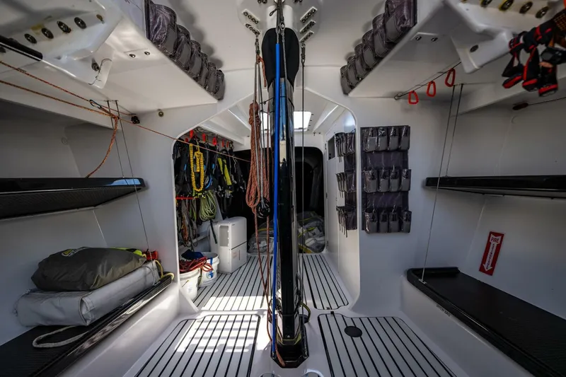 Slide: The Image of Interior of 2007 McConaghy Reichel/Pugh yacht, featuring organized storage and sleek design. - 9