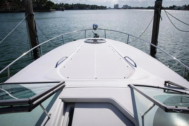 Slide: The Image of 2006 Crownline 320 LS boat on water, viewed from deck, sunny day. - 6
