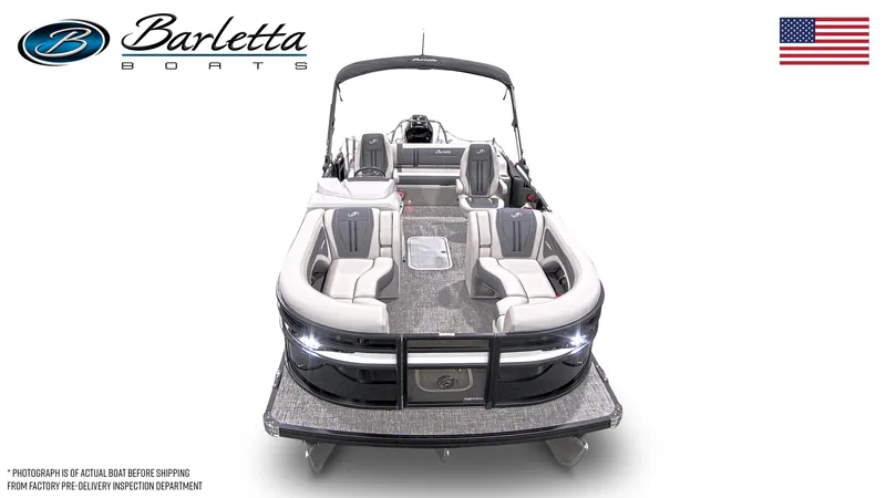 Slide: The Image of 2025 Barletta Corsa Ultra-Lounge 23UC pontoon boat, sleek design, spacious seating, American flag. - 6