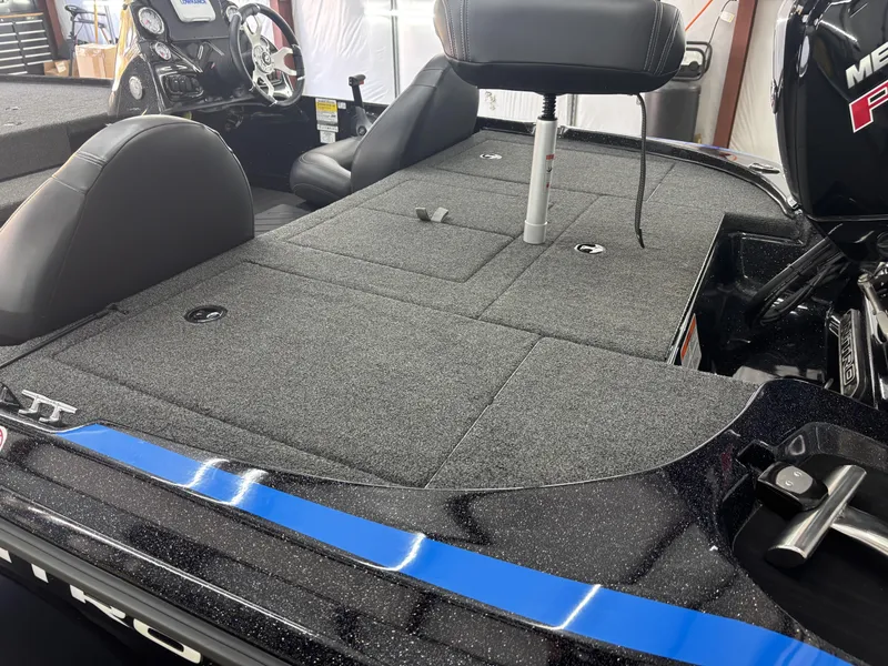 Slide: The Image of 2023 Nitro Z17 boat interior with seating and steering console. - 16