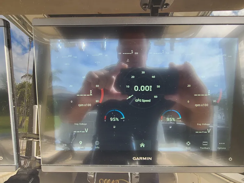 Slide: The Image of Garmin marine display on 2008 World Cat 270 TE showing GPS speed and engine data. - 11