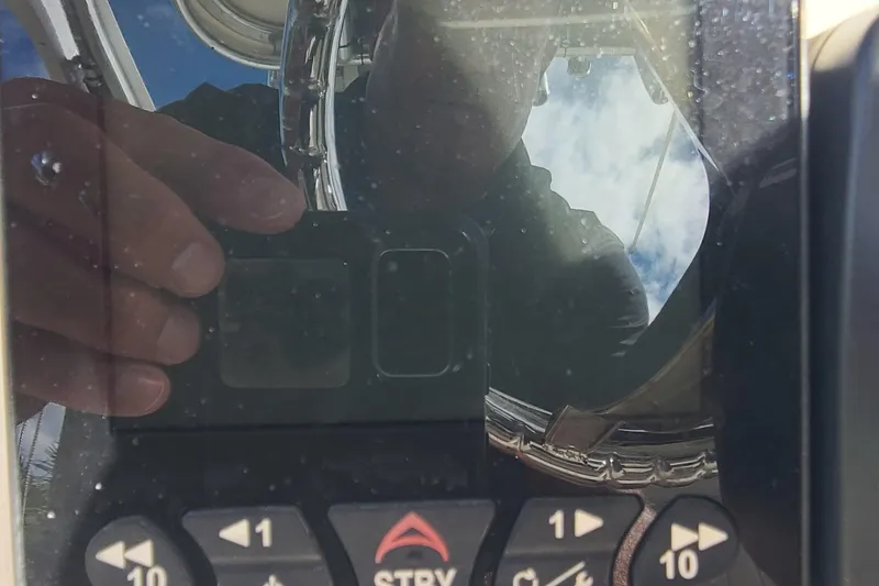 Slide: The Image of Reflection on a boat's control panel, World Cat 270 TE, 2008 model. - 12