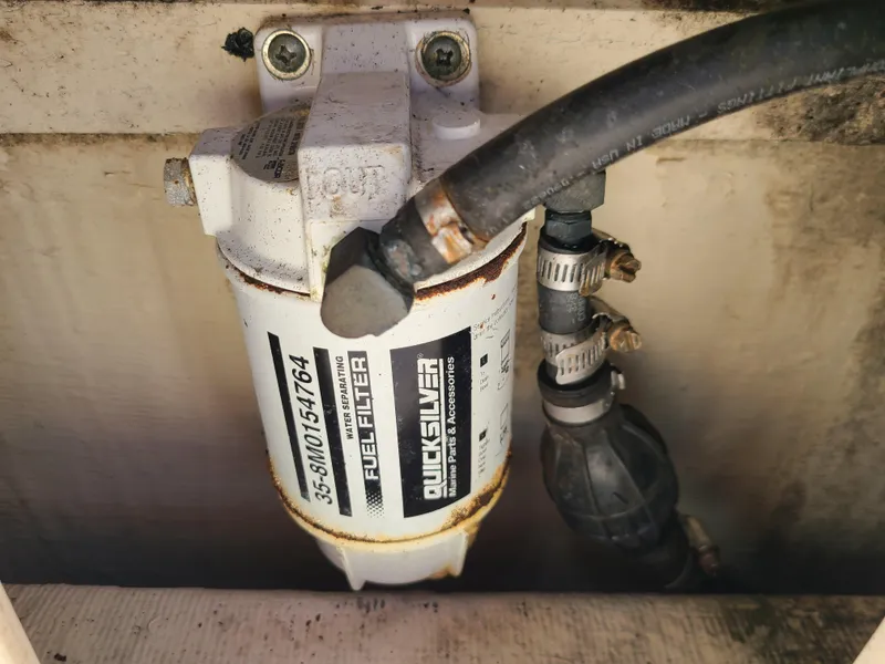 Slide: The Image of Fuel filter system on a 2008 World Cat 270 TE boat, featuring Quicksilver components. - 37