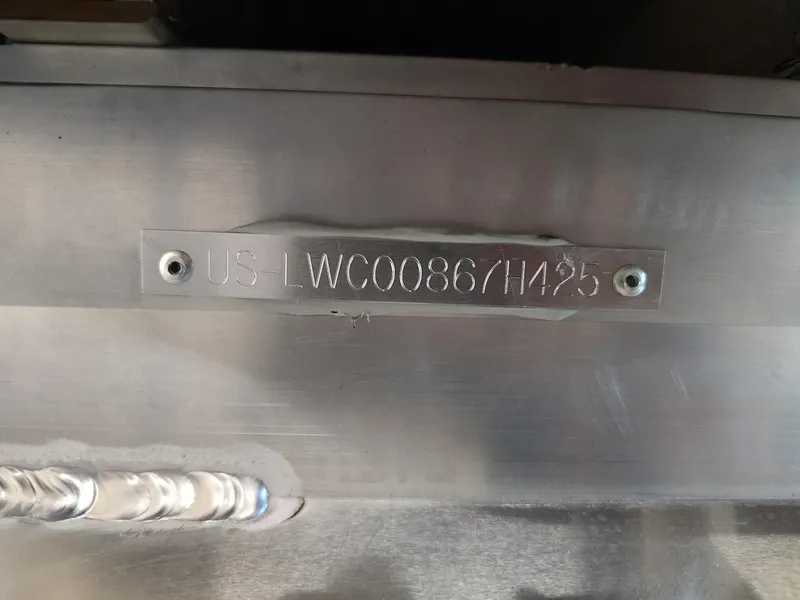 Slide: The Image of Serial number plate on Lowe UC180, 2025 model. - 12