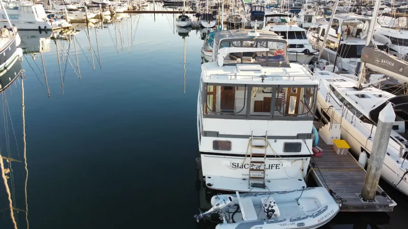 Slide: The Image of 1991 Lien Hwa McKinna 42 Aft Cabin yacht docked in a marina. - 15