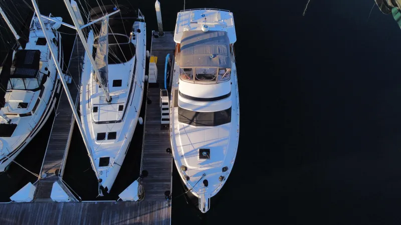 Slide: The Image of Overhead view of 1991 Lien Hwa McKinna 42 Aft Cabin yacht docked beside sailboats. - 18