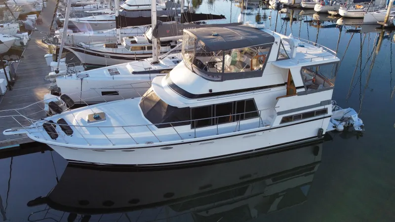 Slide: The Image of 1991 Lien Hwa McKinna 42 Aft Cabin yacht docked in marina. - 21