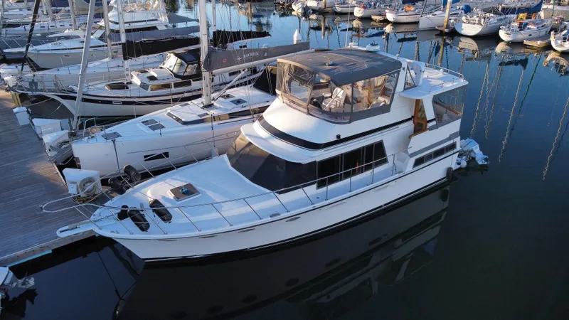 Slide: The Image of 1991 Lien Hwa McKinna 42 Aft Cabin yacht docked in marina. - 22