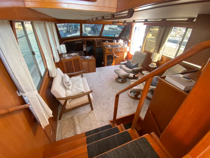 Slide: The Image of Luxurious interior of 1991 Lien Hwa McKinna 42 Aft Cabin yacht with elegant wood finishes. - 26