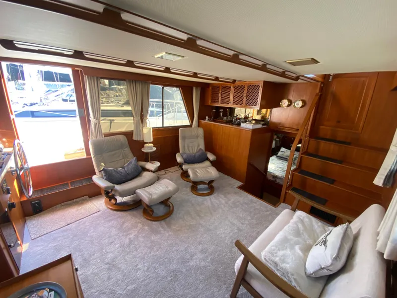 Slide: The Image of Luxurious interior of 1991 Lien Hwa McKinna 42 Aft Cabin yacht with plush seating. - 28
