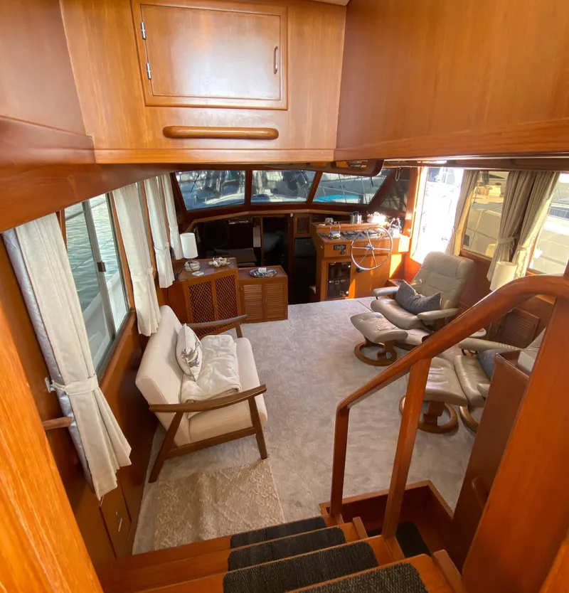 Slide: The Image of Interior of 1991 Lien Hwa McKinna 42 Aft Cabin yacht with wooden furnishings and seating area. - 36