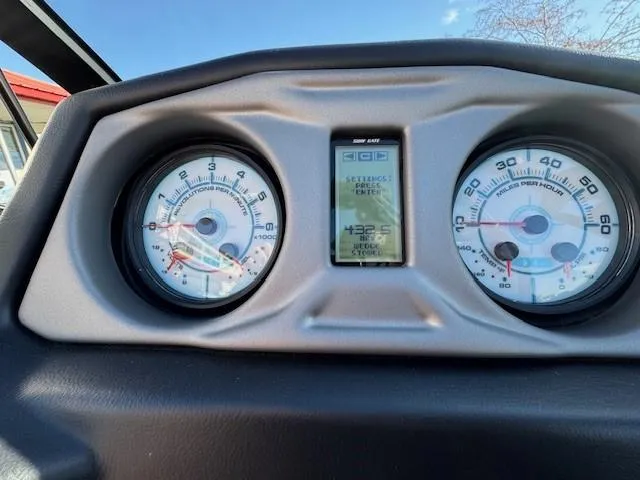 Slide: The Image of Dashboard of 2019 Axis A24 boat with gauges and digital display. - 21