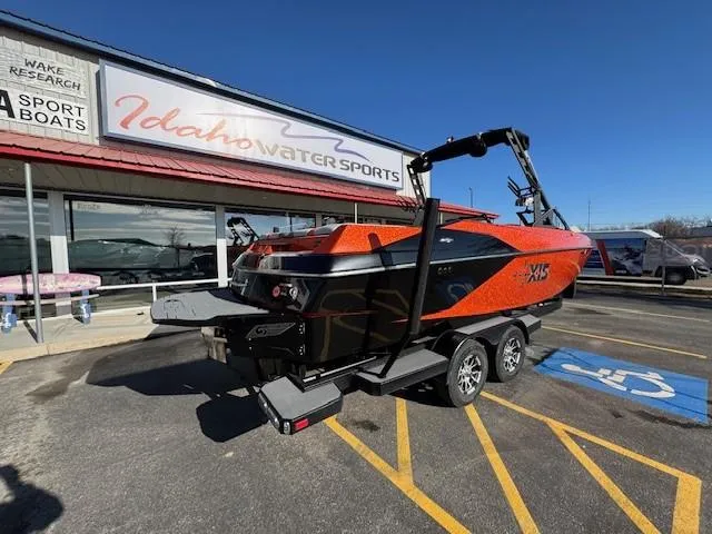 Slide: The Image of 2019 Axis A24 boat in orange and black at Idaho Water Sports dealership. - 3