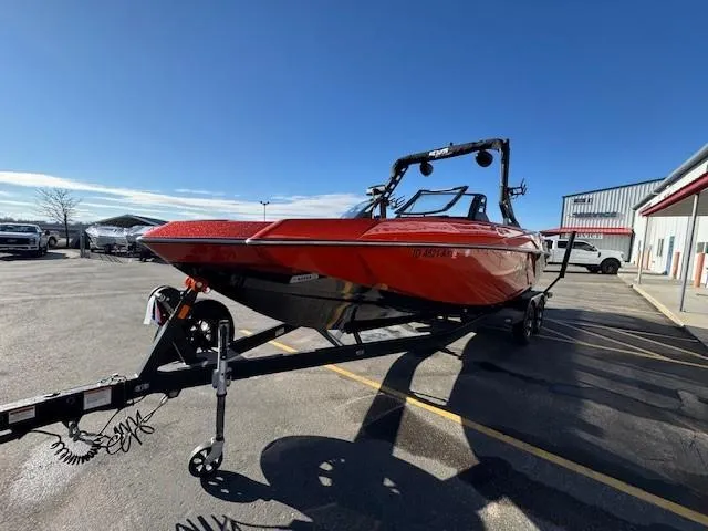 Slide: The Image of 2019 Axis A24 boat on trailer in parking lot, sunny day. - 7