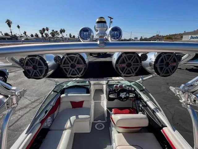 Slide: The Image of 2006 MasterCraft X45 boat interior with speakers and seating, showcasing luxury and design. - 11