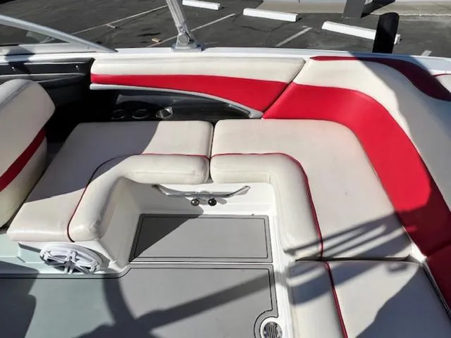 Slide: The Image of 2006 MasterCraft X45 boat interior with red and white seating. - 15