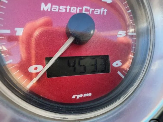 Slide: The Image of Close-up of 2006 MasterCraft X45 tachometer showing 453 RPM. - 19