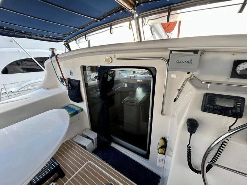 Slide: The Image of Interior view of a 2001 Voyage Maxim yacht cockpit with navigation equipment. - 40