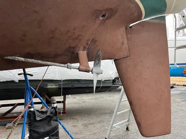 Slide: The Image of 1983 Sabre 38 sailboat hull and propeller in dry dock. - 15