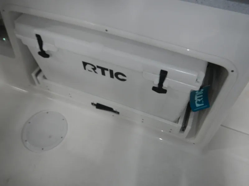 Slide: The Image of RTIC cooler stored in 2025 Sea Fox 268 Traveler boat compartment. - 15