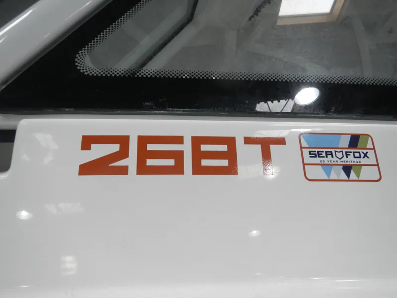 Slide: The Image of Sea Fox 268 Traveler 2025 boat model logo and branding detail. - 19