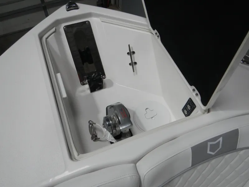 Slide: The Image of Anchor compartment of 2025 Sea Fox 268 Traveler boat, featuring a winch system. - 3