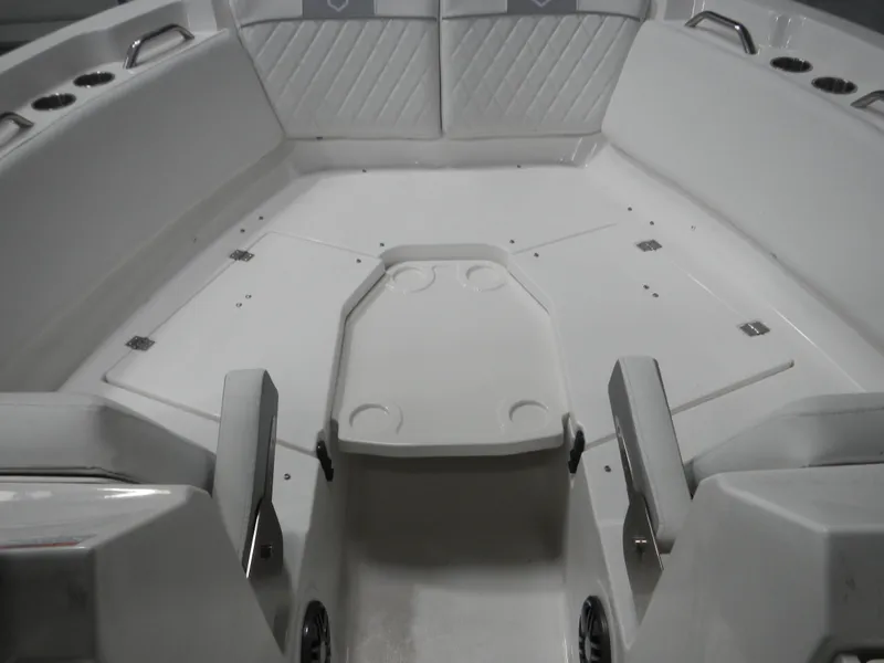 Slide: The Image of Interior view of 2025 Sea Fox 268 Traveler boat, featuring spacious seating and cup holders. - 4