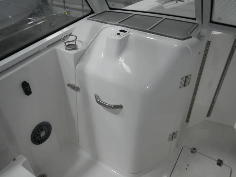 Slide: The Image of 2025 Sea Fox 268 Traveler boat interior with cup holder and speaker. - 6
