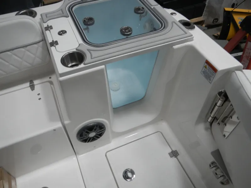 Slide: The Image of 2025 Sea Fox 268 Traveler boat interior with storage compartments and speaker. - 8