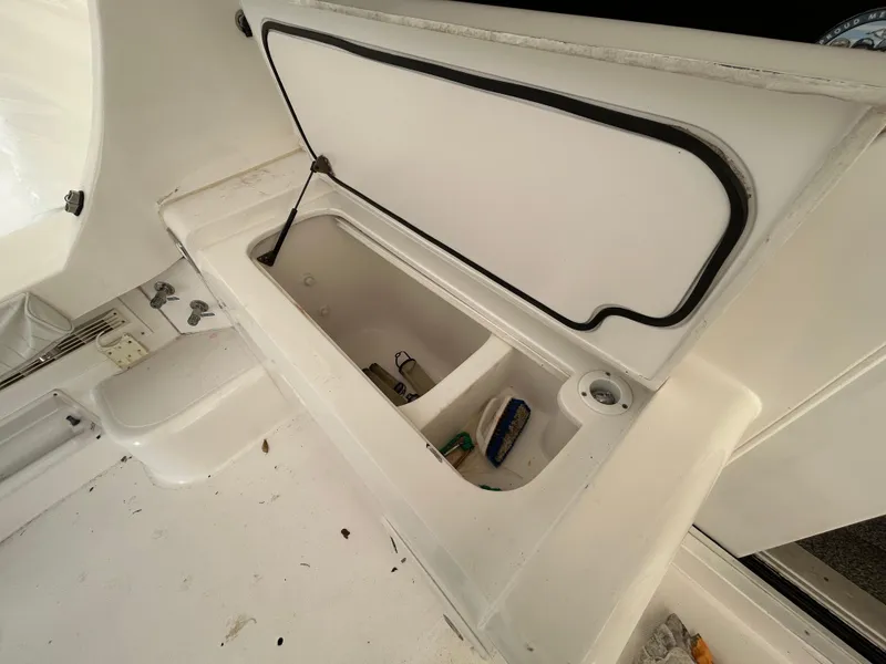 Slide: The Image of Open storage compartment on 2007 Luhrs 36 Convertible boat deck. - 11