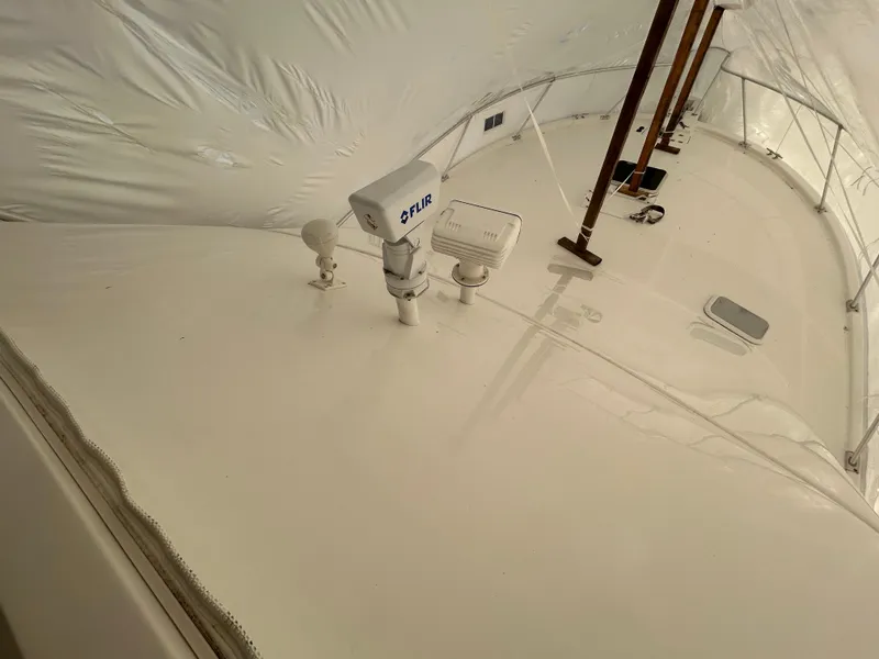 Slide: The Image of 2007 Luhrs 36 Convertible boat deck with FLIR system under protective cover. - 4