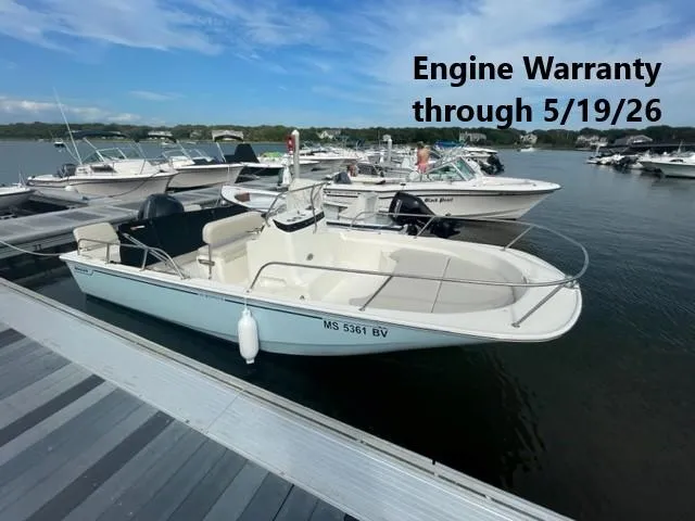 Slide: The Image of 2024 Boston Whaler 190 Montauk boat docked, engine warranty valid through 5/19/26. - 0