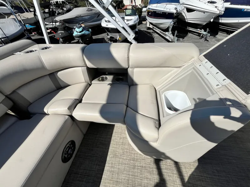 Slide: The Image of 2020 Harris FloteBote Cruiser 230 interior seating with cup holders and storage. - 25