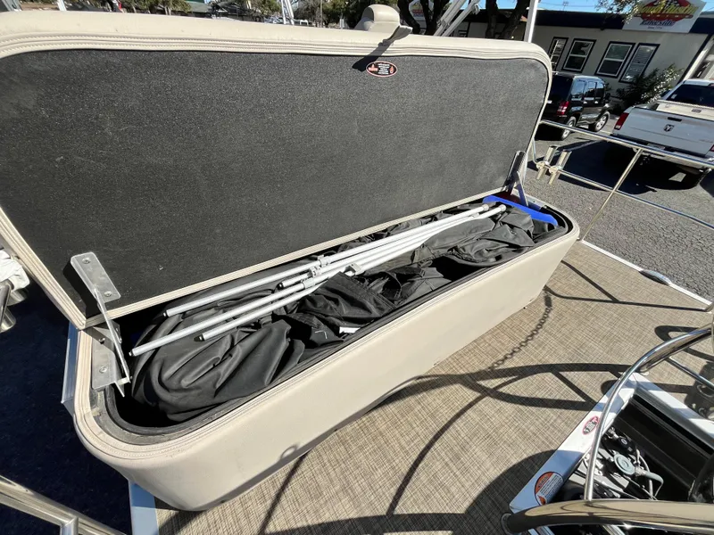 Slide: The Image of Open storage compartment on 2020 Harris FloteBote Cruiser 230 pontoon boat. - 29